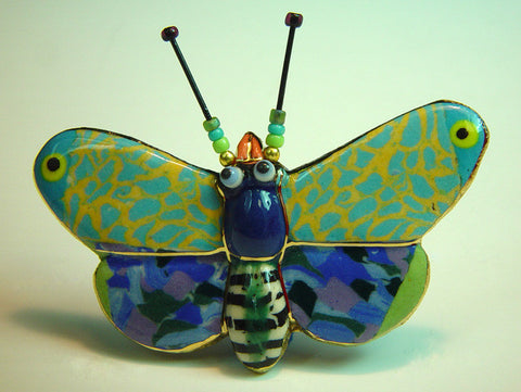 Molly Moth porcelain and mixed media pin