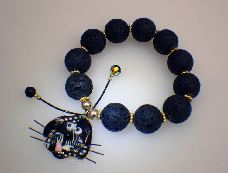 Lava stone bracelet with dog charm of porcelain 