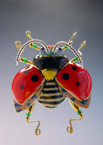 Ladybug/landing porcelain and mixed media pin