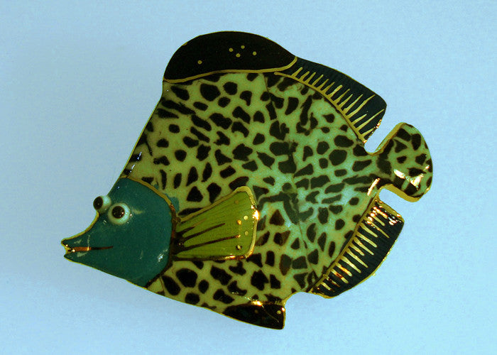 Black-spotted fish porcelain and mixed media pin